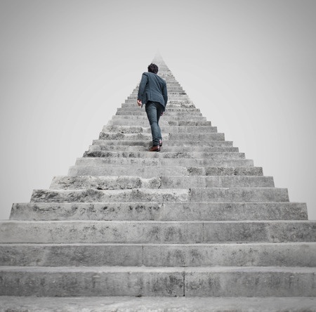 The Mentoring Journey 3 a person looking up a long stairway and getting facing to a challenge.