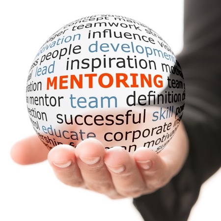 Keys to Creating a Mentoring Culture 5 Concept of mentoring. Transparent ball with inscription mentoring in a hand.
