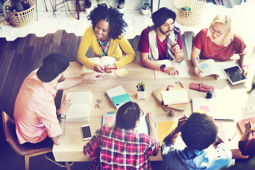 How to Mentor Introverts 5 Diverse Group People Working Together in a Mentoring Group