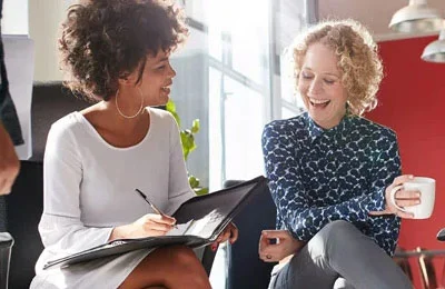 Home 32 coworkers female chatting happy