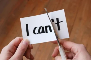 Challenges with Managing a Traditional Mentoring Program 5 A Person cutting a piece of paper to say I can instead of I can't.