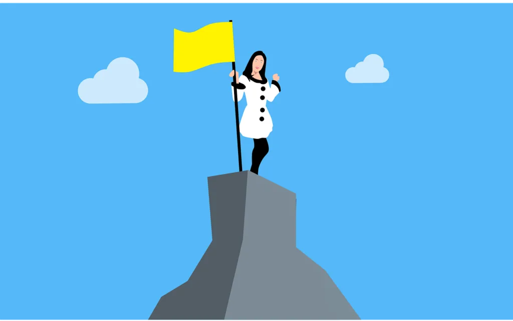 Leadership Development 101: How to Develop New and Existing Leaders 9 Cartoon woman placing a flag on a hill for leadership development.