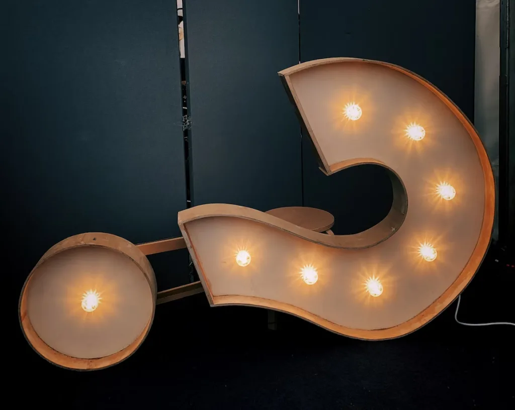 5 Questions All Mentees Should Ask 4 Light up question mark sign laying on it's side