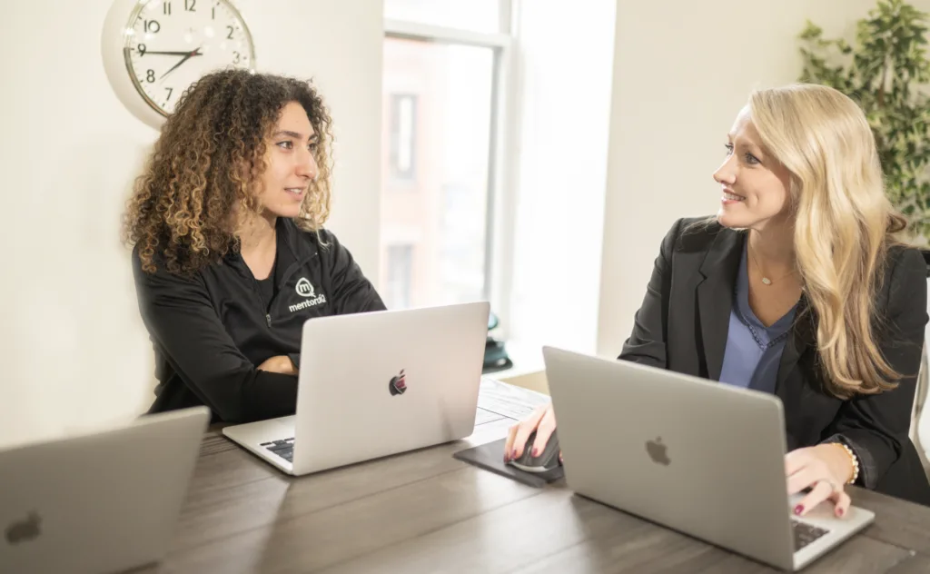 What Are Career Goals? Explanation & 20+ Examples 10 Women mentoring to achieve career goals.