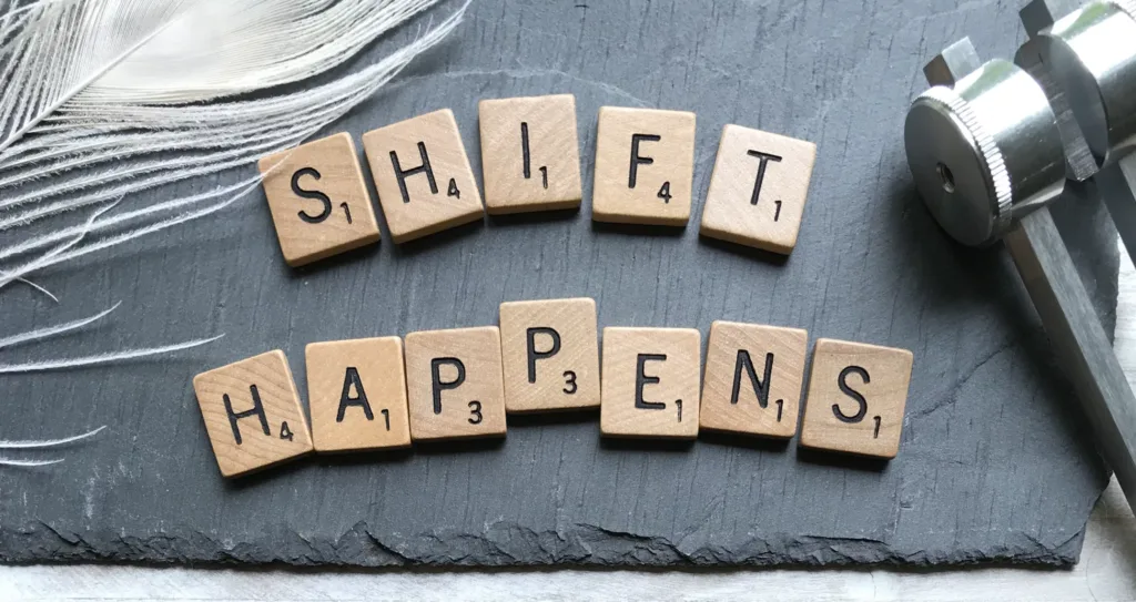 What Are Career Goals? Explanation & 20+ Examples 7 Shfit happens Scrabble tiles for professional development goals.