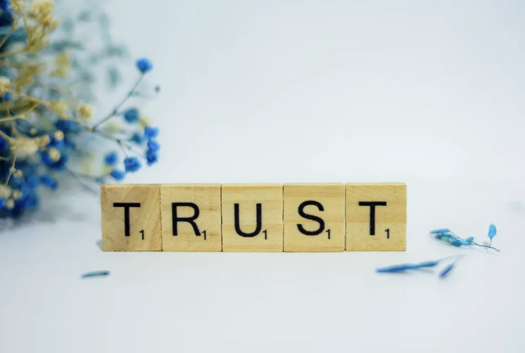 Reverse Mentoring: 11 Tips for Making It Work 8 Wooden scrabble game pieces that spell the word trust.