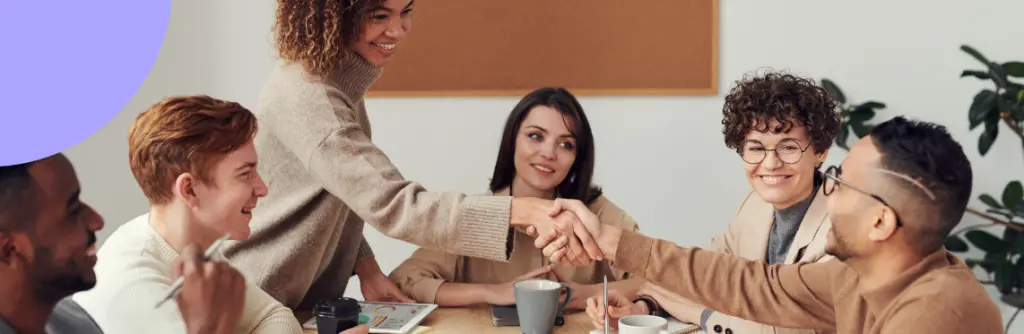 ERG Management Software 19 employees shaking hands